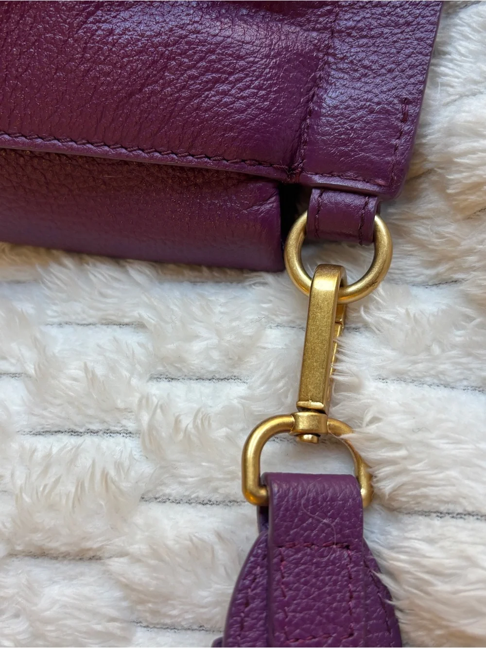 Vince Camuto pebbled purple leather Crossbody bag. Large gold ring hardware.